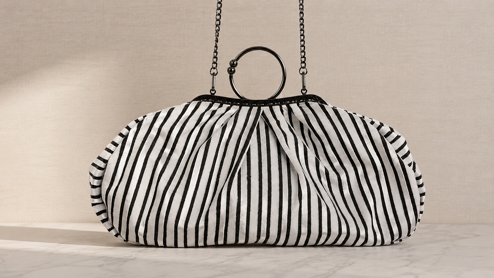 Quiet luxury handbag — Hirsch Atelier woven fabric piece, UAE