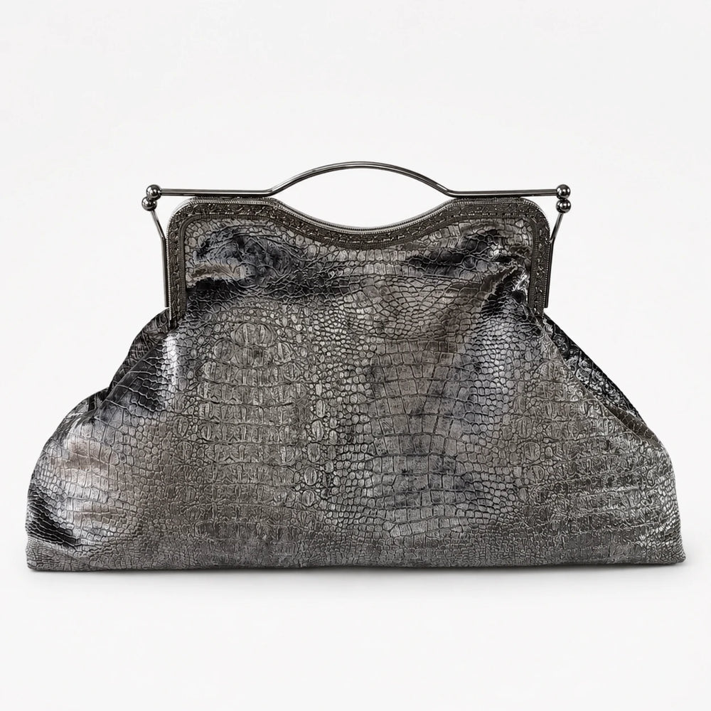 Silver crocodile skin handbag on a white background